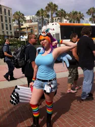 Size: 1936x2592 | Tagged: safe, derpibooru import, rainbow dash, human, clothes, cosplay, costume, g4, goggles, goggles on head, gun, image, irl, irl human, jpeg, photo, san diego comic con, weapon