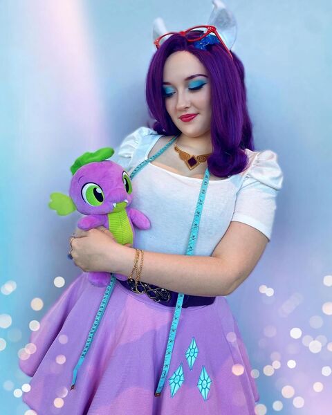 Size: 1080x1349 | Tagged: safe, derpibooru import, rarity, spike, human, clothes, cosplay, costume, cutie mark, cutie mark on clothes, eyeshadow, image, irl, irl human, jpeg, kumoricon, makeup, measuring tape, photo, plushie