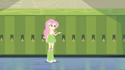 Size: 1280x720 | Tagged: safe, derpibooru import, screencap, fluttershy, equestria girls, backpack, boots, canterlot high, clothes, g4, image, lockers, my little pony equestria girls, png, pointing, polka dot socks, shoes, socks, solo