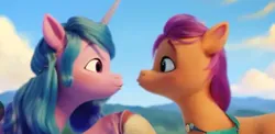 Size: 691x337 | Tagged: safe, derpibooru import, screencap, izzy moonbow, sunny starscout, earth pony, unicorn, g5, my little pony: a new generation, duo, duo female, female, horn, image, jpeg, kissy face, out of context, puckered lips