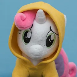 Size: 1536x1536 | Tagged: safe, ai content, derpibooru import, machine learning generated, prompter:enterusxrname, sweetie belle, pony, unicorn, clothes, g4, hoodie, horn, image, jpeg, plushie, solo