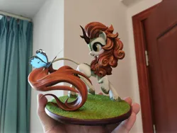 Size: 4624x3472 | Tagged: safe, artist:griffonleek, artist:tinybenz, derpibooru import, autumn blaze, butterfly, insect, kirin, blushing, butterfly on tail, craft, cute, female, figurine, g4, hoof fluff, image, insect on tail, jpeg, leonine tail, multiple angles, open mouth, photo, picture, raised hoof, raised leg, smiling, solo, tail, yellow eyes