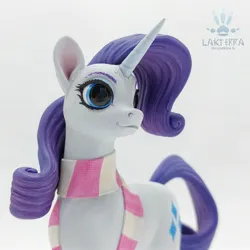 Size: 2560x2560 | Tagged: safe, alternate angle, alternate version, artist:lakterra, derpibooru import, rarity, pony, unicorn, close-up, clothes, craft, female, figurine, g4, horn, image, irl, jpeg, mare, photo, polymer clay, scarf, signature, simple background, smiling, solo, striped scarf, tail, white background
