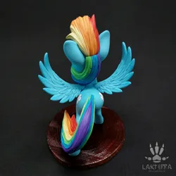Size: 2560x2560 | Tagged: safe, alternate angle, alternate version, artist:lakterra, derpibooru import, rainbow dash, pegasus, pony, both cutie marks, butt, craft, female, figurine, g4, high angle, image, irl, jpeg, mare, photo, plot, polymer clay, rear view, signature, solo, spread wings, stand, tail, wings