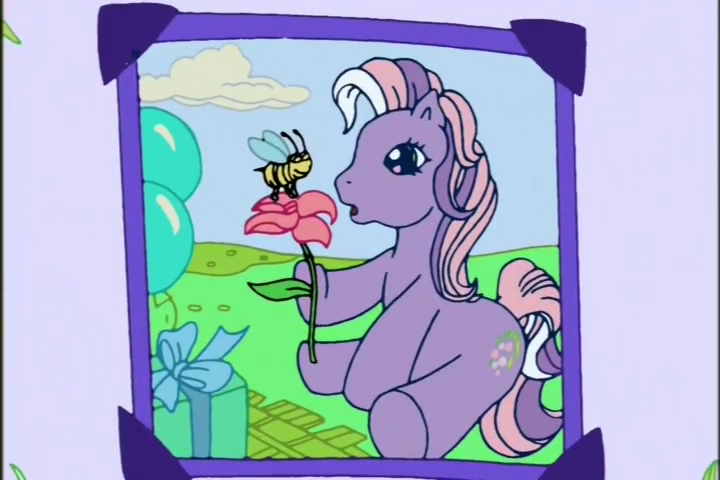 Size: 720x480 | Tagged: safe, derpibooru import, screencap, wysteria, bee, earth pony, insect, pony, a charming birthday, g3, balloon, birthday book, cloud, female, flower, hoof hold, image, looking at something, mare, open mouth, outdoors, png, ponyville surprise birthday book, present, scrapbook, sitting, solo