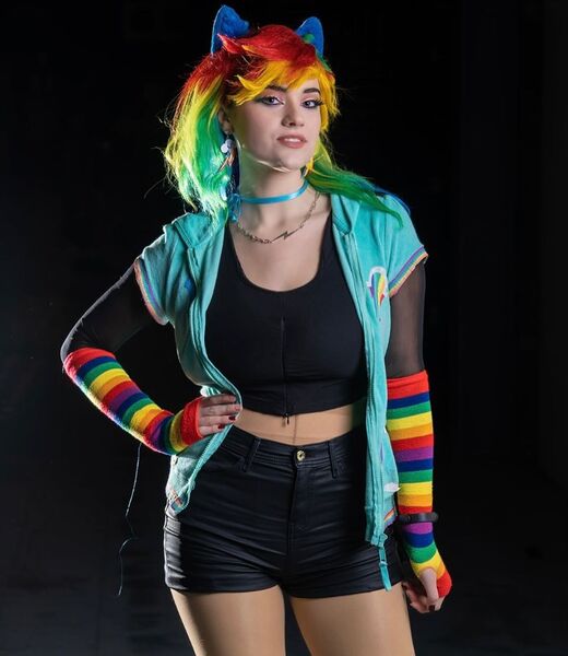 Size: 1080x1245 | Tagged: safe, artist:gianaxrose, derpibooru import, rainbow dash, human, clothes, cosplay, costume, g4, hand on hip, image, irl, irl human, jpeg, multicolored hair, photo, rainbow hair, solo