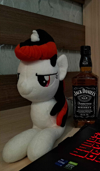 Size: 2029x3468 | Tagged: photographer needed, safe, edit, oc, oc:blackjack, unofficial characters only, pony, fallout equestria, fallout equestria: project horizons, alcohol, computer, cropped, female, image, jack daniels, jpeg, laptop computer, mare, photo, plushie, whiskey