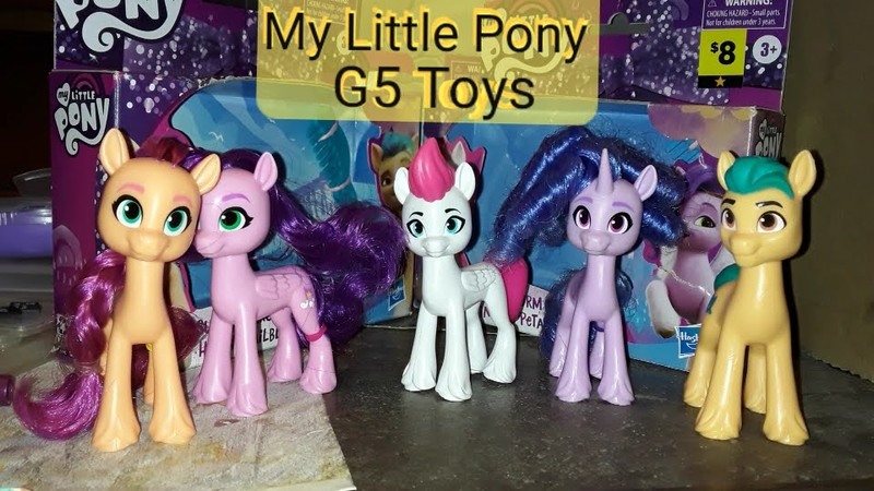 Size: 960x540 | Tagged: safe, derpibooru import, hitch trailblazer, izzy moonbow, pipp petals, sunny starscout, zipp storm, earth pony, pegasus, pony, unicorn, g5, brush, brushable, dollar general, horn, image, jpeg, logo, mane five, merchandise, photo, price tag, text, toy