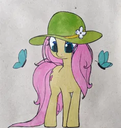 Size: 1213x1280 | Tagged: safe, artist:nutellaenjoyer, derpibooru import, fluttershy, butterfly, insect, pegasus, pony, cute, female, flower on hat, hat, hat hair, image, jpeg, looking at butterfly, mare, solo, traditional art, wingless