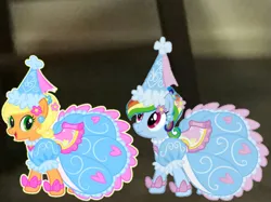 Size: 719x538 | Tagged: safe, derpibooru import, applejack, rainbow dash, earth pony, pegasus, pony, g4, applejack also dresses in style, bow, clothes, dress, duo, duo female, ear piercing, female, flower, flower in hair, froufrou glittery lacy outfit, hat, hennin, image, jewelry, mare, necklace, piercing, png, princess, princess applejack, princess rainbow dash, rainbow dash always dresses in style