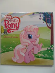 Size: 455x606 | Tagged: safe, derpibooru import, pinkie pie (g3), earth pony, pony, g3, 2011, calendar, female, g3.5, image, jpeg, mare, merchandise, my little pony logo, photo, rainbow, rearing, solo, standing on two hooves, tree