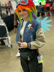 Size: 3024x4032 | Tagged: safe, artist:brinycosplay, derpibooru import, rainbow dash, human, g4, clothes, cosplay, costume, cutie mark, cutie mark on clothes, image, irl, irl human, jpeg, multicolored hair, otakon, otakon 2023, photo, rainbow hair