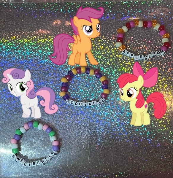 Size: 699x720 | Tagged: safe, artist:lnx1ynight16, derpibooru import, part of a set, apple bloom, scootaloo, sweetie belle, earth pony, pegasus, pony, unicorn, bracelet, cutie mark crusaders, horn, image, jewelry, jpeg, kandi, smiling, unicorn horn, wings