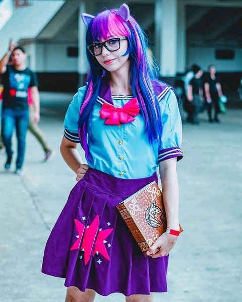 Size: 1080x1351 | Tagged: safe, artist:flutterbutter cosplay, derpibooru import, twilight sparkle, human, g4, book, book of harmony, clothes, cosplay, costume, female, glasses, image, irl, irl human, jpeg, photo