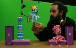 Size: 4945x3116 | Tagged: safe, artist:inspiranimation, derpibooru import, pinkie pie, rainbow dash, earth pony, human, pegasus, pony, cake off, g4, my little pony: pony life, my little pony: stop motion short, behind the scenes, cake, food, green screen, high res, image, irl, irl human, jpeg, photo