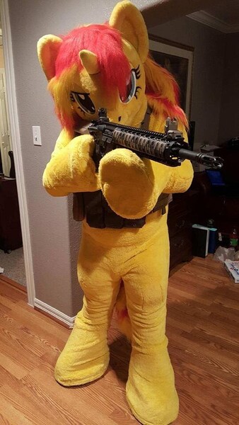 Size: 540x960 | Tagged: safe, artist:atalonthedeer, derpibooru import, sunset shimmer, human, unicorn, g4, 2016, aiming, ar15, bulletproof vest, clothes, cosplay, costume, delet this, fursuit, gun, image, irl, irl human, jpeg, magpul, photo, pony costume, ponysuit, rifle, smiling, smirk, weapon