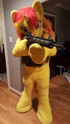 Size: 540x960 | Tagged: safe, artist:atalonthedeer, derpibooru import, sunset shimmer, human, unicorn, g4, 2016, aiming, ar15, bulletproof vest, clothes, cosplay, costume, delet this, fursuit, gun, image, irl, irl human, jpeg, magpul, photo, pony costume, ponysuit, rifle, smiling, smirk, weapon