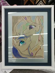 Size: 3120x4160 | Tagged: safe, artist:edgarkingmaker, derpibooru import, princess celestia, princess luna, alicorn, pony, g4, colored pencil drawing, crown, duo, duo female, etsy, eye contact, female, framed picture, high res, image, jewelry, jpeg, looking at each other, looking at someone, mare, peytral, photo, regalia, royal sisters, siblings, sisters, smiling, smiling at each other, spread wings, traditional art, wings