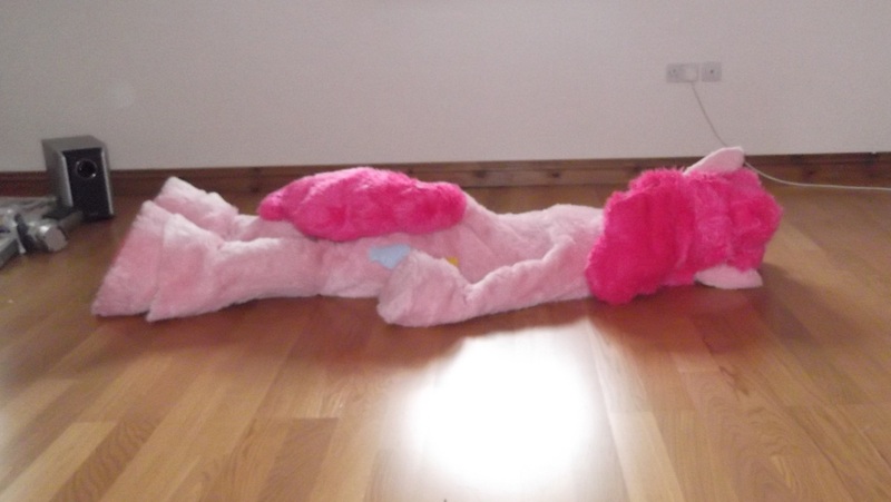 Size: 1430x806 | Tagged: safe, artist:spainfischer, derpibooru import, pinkie pie, fursuit, image, indoors, irl, jpeg, lying down, lying on the floor, on floor, photo, ponysuit, prone, solo