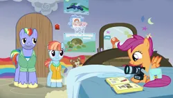 Size: 1280x727 | Tagged: safe, derpibooru import, edit, edited screencap, screencap, bow hothoof, scootaloo, windy whistles, pegasus, pony, g4, parental glideance, bed, bedroom, camera, clothes, cute, cutealoo, female, filly, foal, image, jacket, jpeg, male, mare, poster, scrapbook, smiling, spread wings, stallion, trio, wings