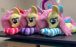 Size: 2419x1501 | Tagged: safe, artist:qtpony, derpibooru import, fluttershy, pony, bow, clothes, hair bow, image, irl, jpeg, photo, plushie, self paradox, self ponidox, socks, striped socks