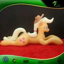 Size: 600x600 | Tagged: safe, derpibooru import, applejack, earth pony, inflatable pony, pony, g4, bootleg, carpet, facing right, female, frame, hair tie, hat, hongyi, image, inflatable, inflatable earth pony, irl, jpeg, lidded eyes, lying down, mare, opaque inflatable, photo, ponytail, prone, red carpet, solo