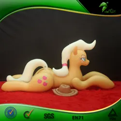 Size: 600x600 | Tagged: safe, derpibooru import, applejack, earth pony, inflatable pony, pony, g4, bootleg, carpet, facing right, female, frame, hair tie, hat, hat off, hongyi, image, inflatable, inflatable earth pony, irl, jpeg, lidded eyes, lying down, mare, opaque inflatable, photo, ponytail, prone, red carpet, solo