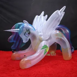 Size: 750x750 | Tagged: safe, derpibooru import, princess celestia, alicorn, inflatable pony, pony, g4, bootleg, carpet, creator:hongyi, female, hongyi, hoof shoes, image, inflatable, inflatable alicorn, irl, iwtcird, jpeg, mare, meme, obtrusive watermark, peytral, photo, red carpet, solo, spread wings, translucent inflatable, valve, watermark, wingboner, wings