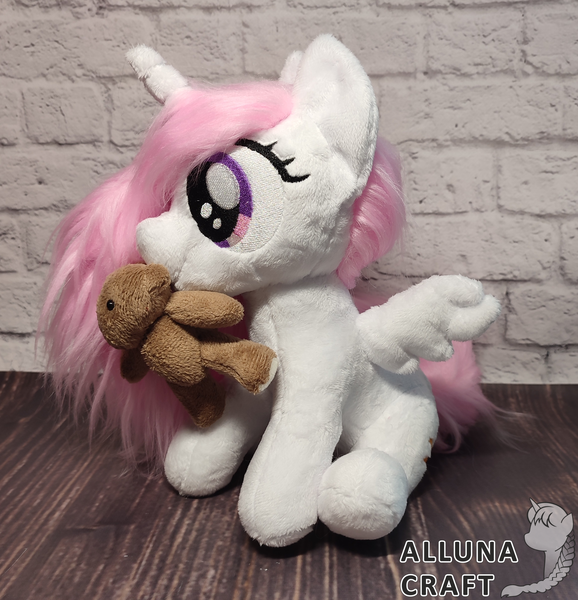 Size: 2320x2410 | Tagged: safe, artist:allunacraft, derpibooru import, princess celestia, pony, cewestia, female, filly, image, irl, mouth hold, photo, plushie, png, solo, teddy bear, younger