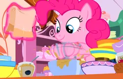 Size: 898x576 | Tagged: safe, derpibooru import, screencap, pinkie pie, earth pony, pony, g4, secrets and pies, batter, egg beater, food, image, indoors, jpeg, kitchen, solo, sugarcube corner