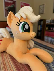 Size: 3072x4096 | Tagged: safe, artist:littlefairyswonders, derpibooru import, applejack, earth pony, pony, g4, female, image, irl, jpeg, lying down, missing accessory, photo, plushie, solo