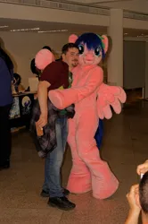 Size: 3264x4912 | Tagged: safe, artist:atalonthedeer, derpibooru import, firefly, human, g1, 2014, duo focus, fursuit, galacon, image, indoors, irl, irl human, jpeg, photo, ponysuit