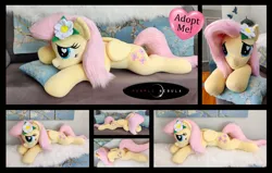 Size: 6000x3820 | Tagged: safe, artist:purplenebulastudios, derpibooru import, fluttershy, pony, g4, flower, flower in hair, image, irl, jpeg, lying down, photo, plushie, prone, solo