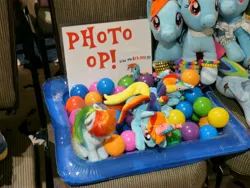 Size: 3648x2736 | Tagged: safe, derpibooru import, rainbow dash, pegasus, g4, ball pit, chair, dashcon, female, harmonycon, harmonycon 2025, image, jpeg, photo, plushie