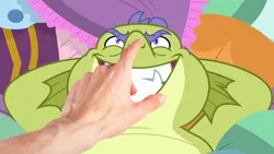 Size: 1280x720 | Tagged: safe, derpibooru import, edit, edited screencap, screencap, dragon, father knows beast, g4, arm behind head, boop, boop edit, disembodied hand, evil grin, grin, hand, image, lying down, my little pony, png, sludge (g4), smiling, thick eyebrows