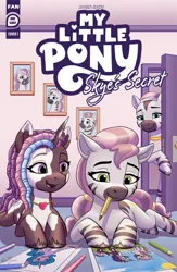 Size: 1920x2946 | Tagged: safe, artist:robin jacks, derpibooru import, idw, izzy moonbow, violette rainbow, pony, unicorn, zebra, g5, 2025, aloysius, clock, colored pencils, door, doorway, drawing, dreadlocks, duo focus, fan cover, female, filly, foal, horn, i can't believe it's not idw, image, indoors, jewelry, jpeg, lidded eyes, looking down, lying down, mare, mariama, mouth hold, my little pony logo, my little pony: skye's secret, necklace, open mouth, open smile, picture, picture frame, prone, signature, skye, smiling, tail, trio, trio female, unshorn fetlocks, vitiligo, watching