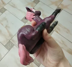 Size: 2560x2352 | Tagged: safe, artist:rasmary, derpibooru import, oc, oc:sacred canna, unofficial characters only, pony, unicorn, fallout equestria, 2026, amputee, craft, crafting, female, figure, figurine, full body, handmade, horn, image, indoors, irl, jpeg, lying down, mare, photo, polymer clay, prosthetic limb, prosthetics, quadrupedal, scar, sculpture, solo, statue, statuette, two toned hair, two toned mane
