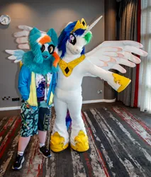 Size: 1920x2253 | Tagged: safe, derpibooru import, princess celestia, oc, oc:phoenix redtail, human, g4, 2026, fursuit, image, indoors, irl, irl human, jewelry, jpeg, photo, ponysuit, regalia, solo